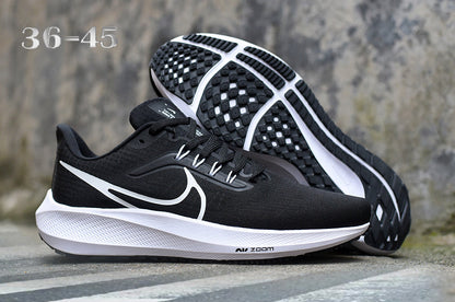 Nike Road Running Shoes in Light Gray with Orange Swoosh