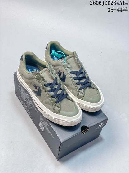 Converse Low-Top Lace-Up Sneakers in Olive and Navy