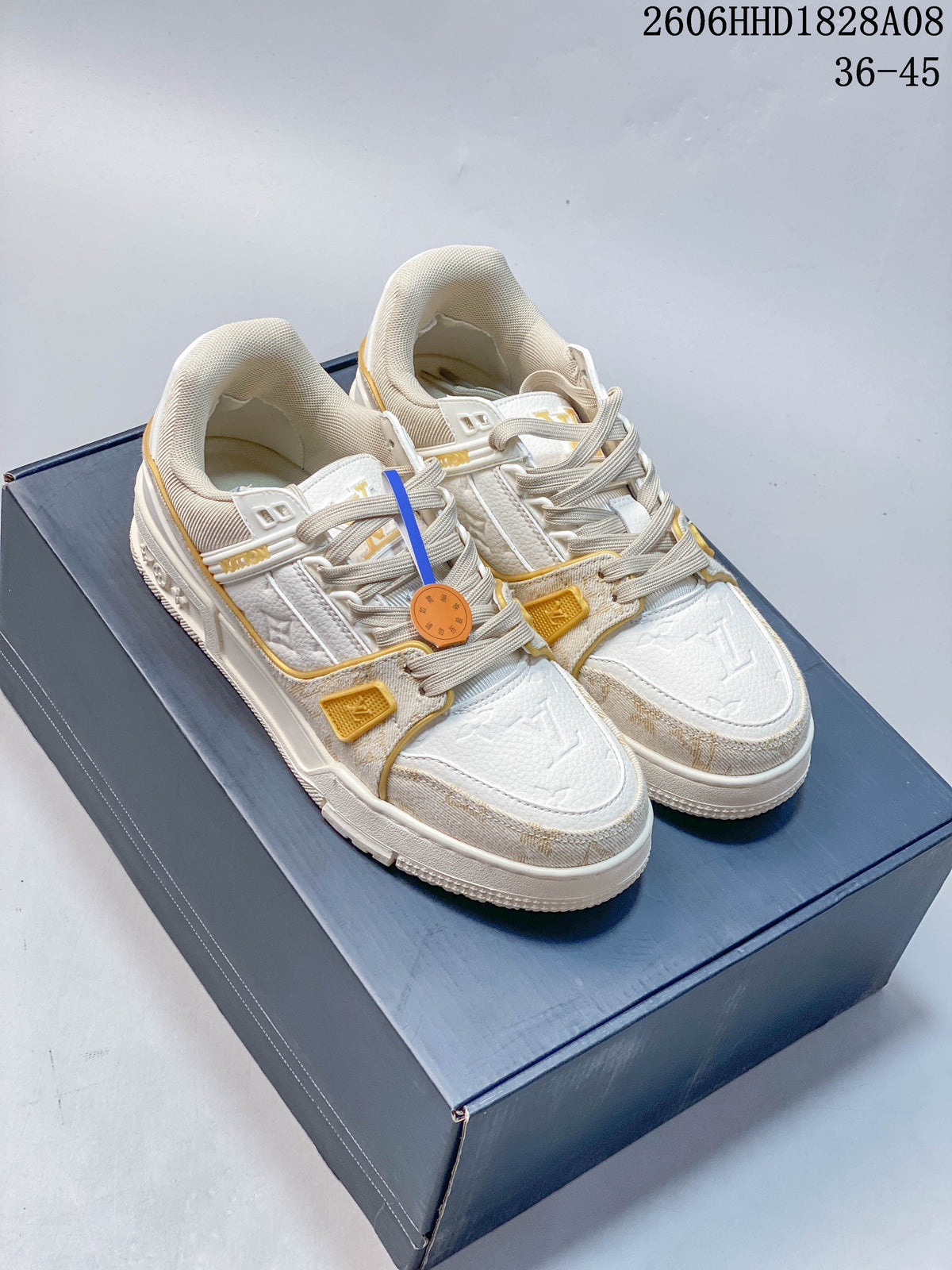 Louis Vuitton Archlight Low-Top Sneakers in White and Gold