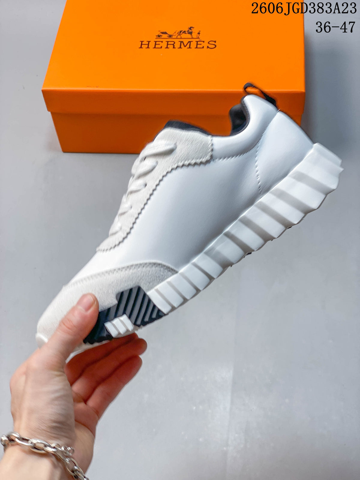 Hermès Low-Top Sneakers in White and Black
