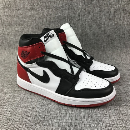Pair of Air Jordan 1 high-tops with perforated white toe panels and black laces