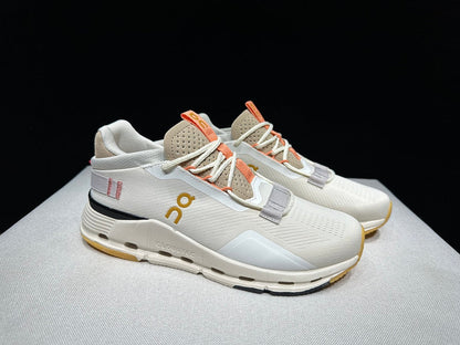 On Cloudnova 2 Sneakers in Ivory and Orange