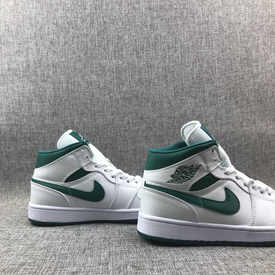 Side-by-side rear-quarter view of the two sneakers.