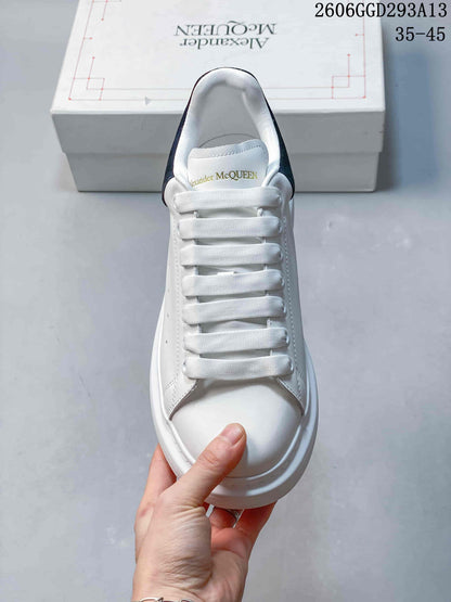 Alexander McQueen White Low-Top Sneakers with Black Heel Tab