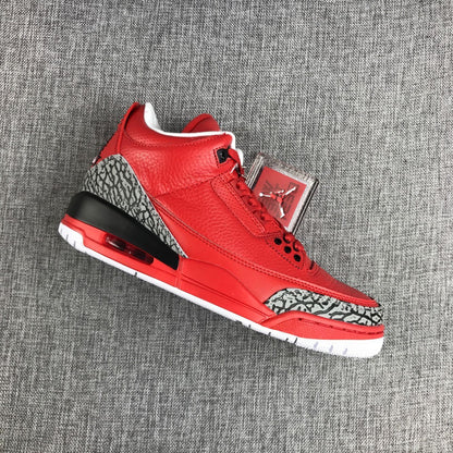 Angled view highlighting the red upper and elephant-print panels on the toe and heel.