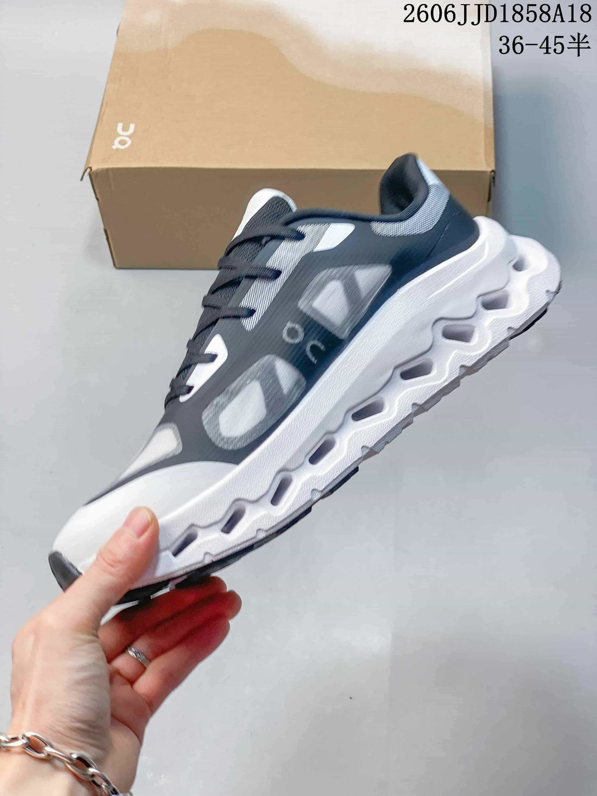 On Cloudtilt Remix Sneakers in Black, White and Grey