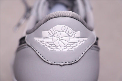Close-up of the grey heel panel with an Air Dior winged basketball emblem.