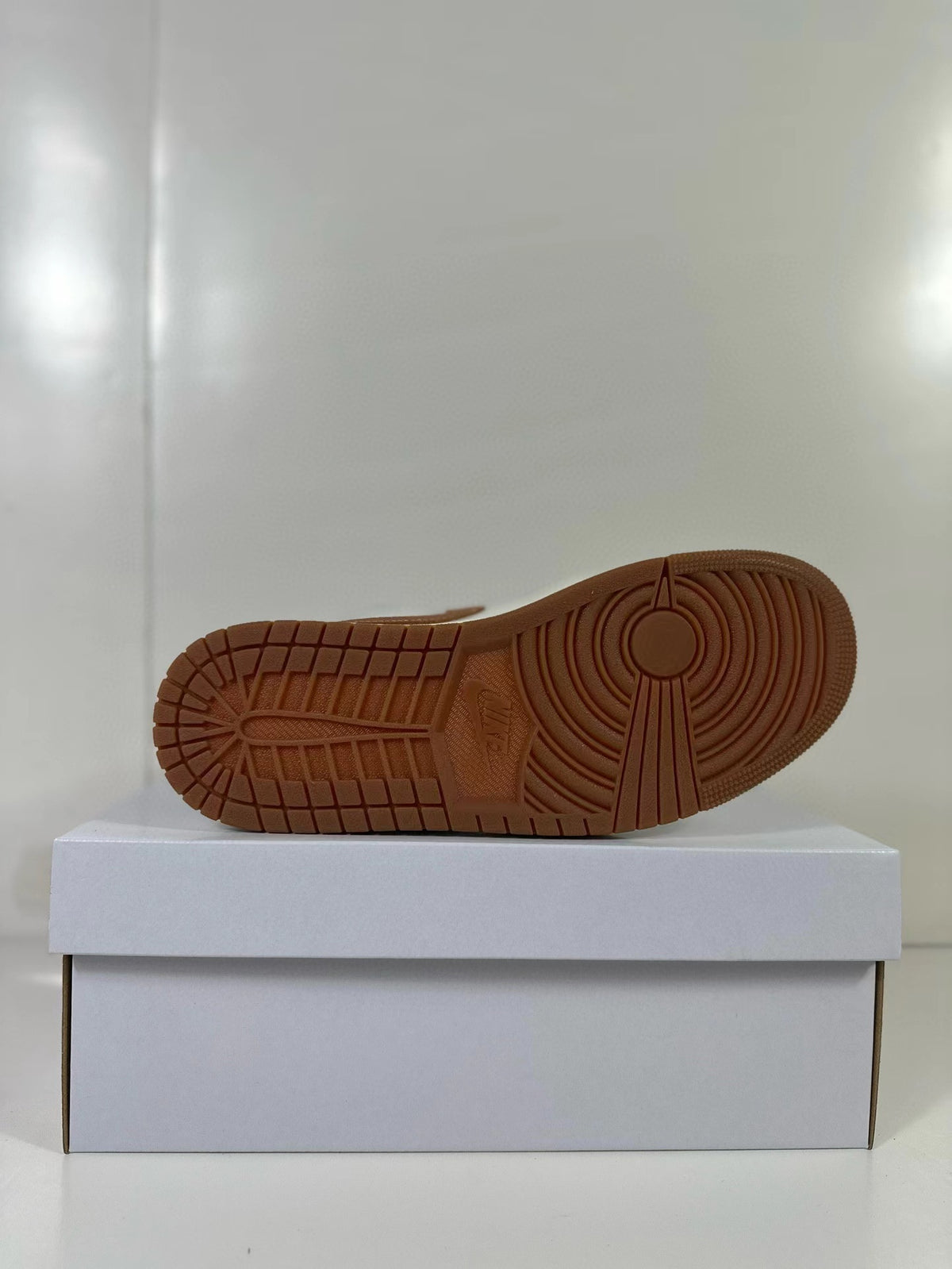 Underside view of the brown rubber outsole