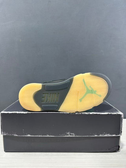 Bottom view of a Jordan Air Jordan 5 sneaker showing a translucent yellow-tinted outsole with Jordan and Nike markings.