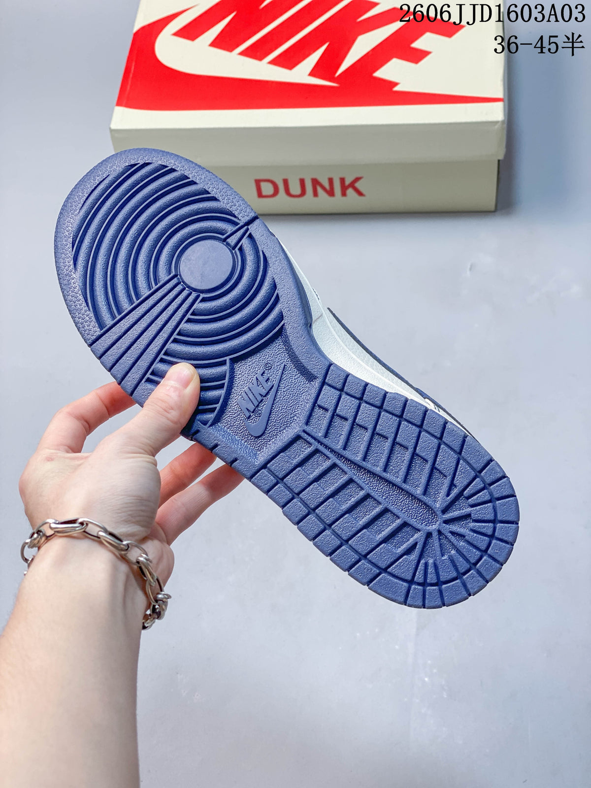 Nike SB Dunk Low White and Blue Low-Top Sneakers