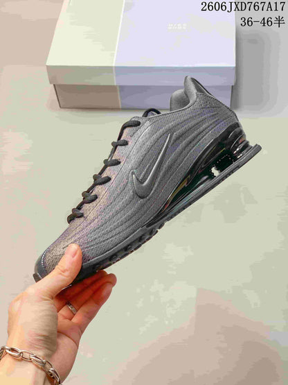 Nike Shox TL Low-Top Sneakers in Gray