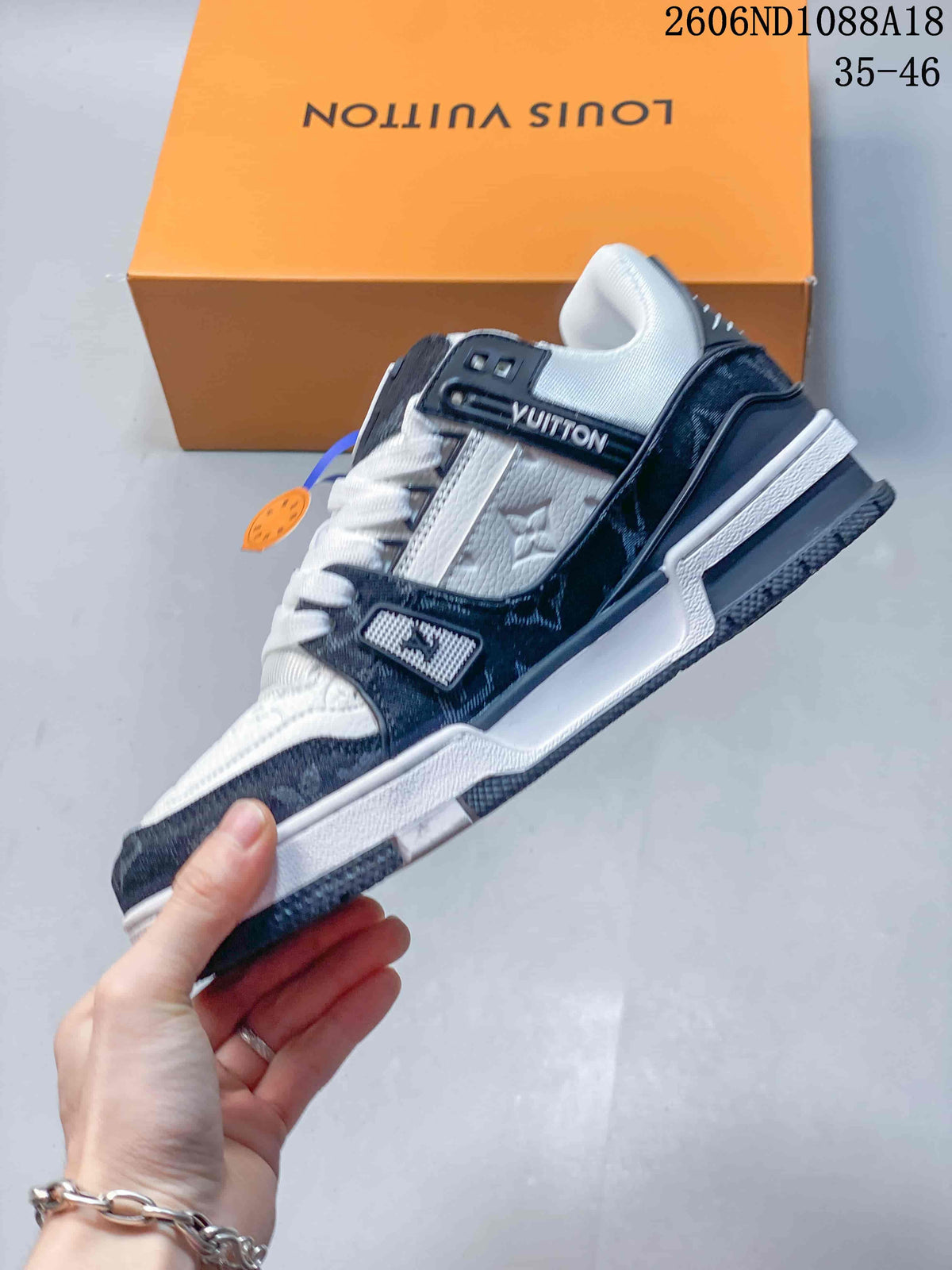 Louis Vuitton Trainer Low-Top Sneakers in White and Navy