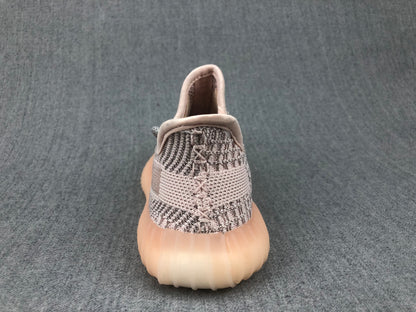 Rear view showing the padded collar, heel construction, and translucent sole.