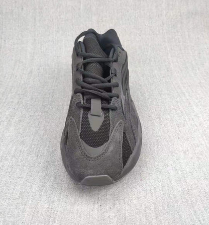 Top view of the lace-up sneaker showing the tongue and toe design.