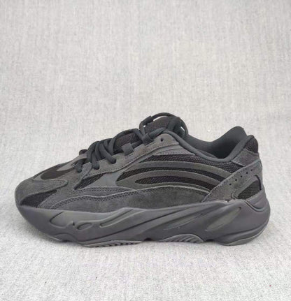 Side profile showing the layered upper and sculpted midsole.