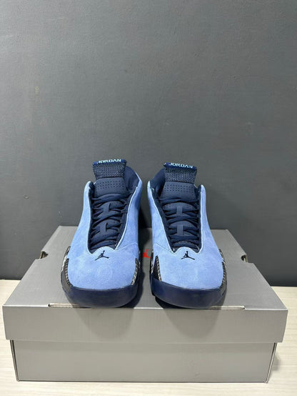 Front view of the pair showing blue uppers, navy laces, Jordan tongue branding, and high-top construction.