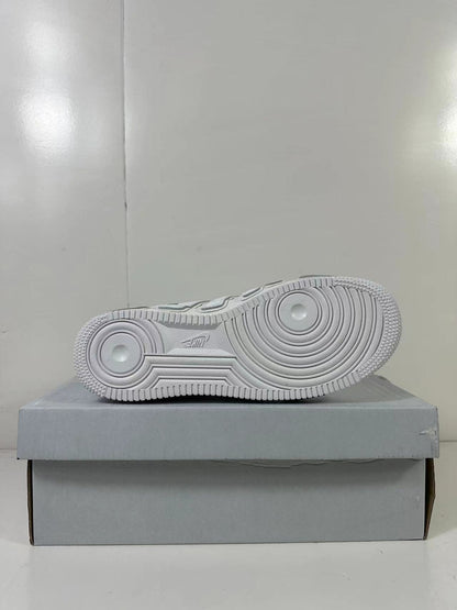 Underside view showing the circular traction pattern on the white rubber outsole.