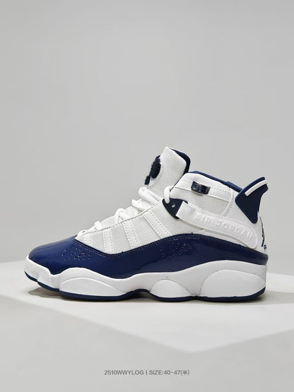 Close side view showing the white upper, navy overlays, perforations, and raised side branding.