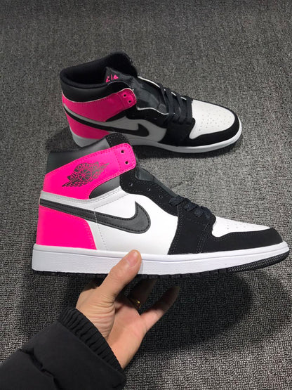 Side view of the high-top sneaker with pink collar and heel accents, black overlays, white panels, and a dark swoosh-shaped side mark.