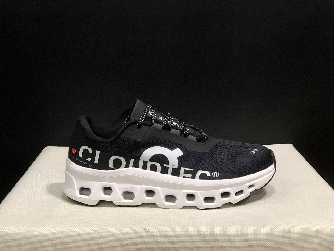 On Cloudmonster Black and White Running Sneakers
