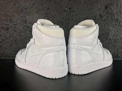 Rear view of the pair showing the Jordan Wings emblems, heel panels and white rubber soles.