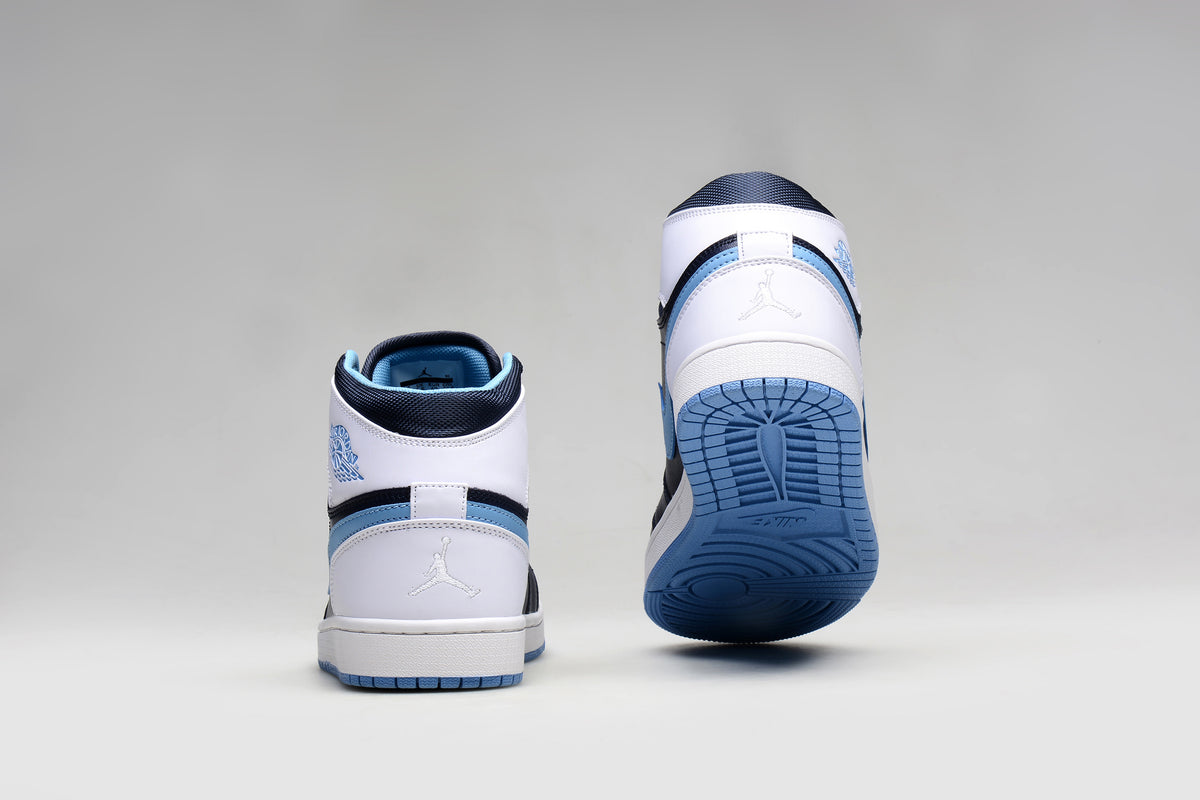 Rear views of Jordan 1 Retro sneakers with white heel panels and blue outsoles