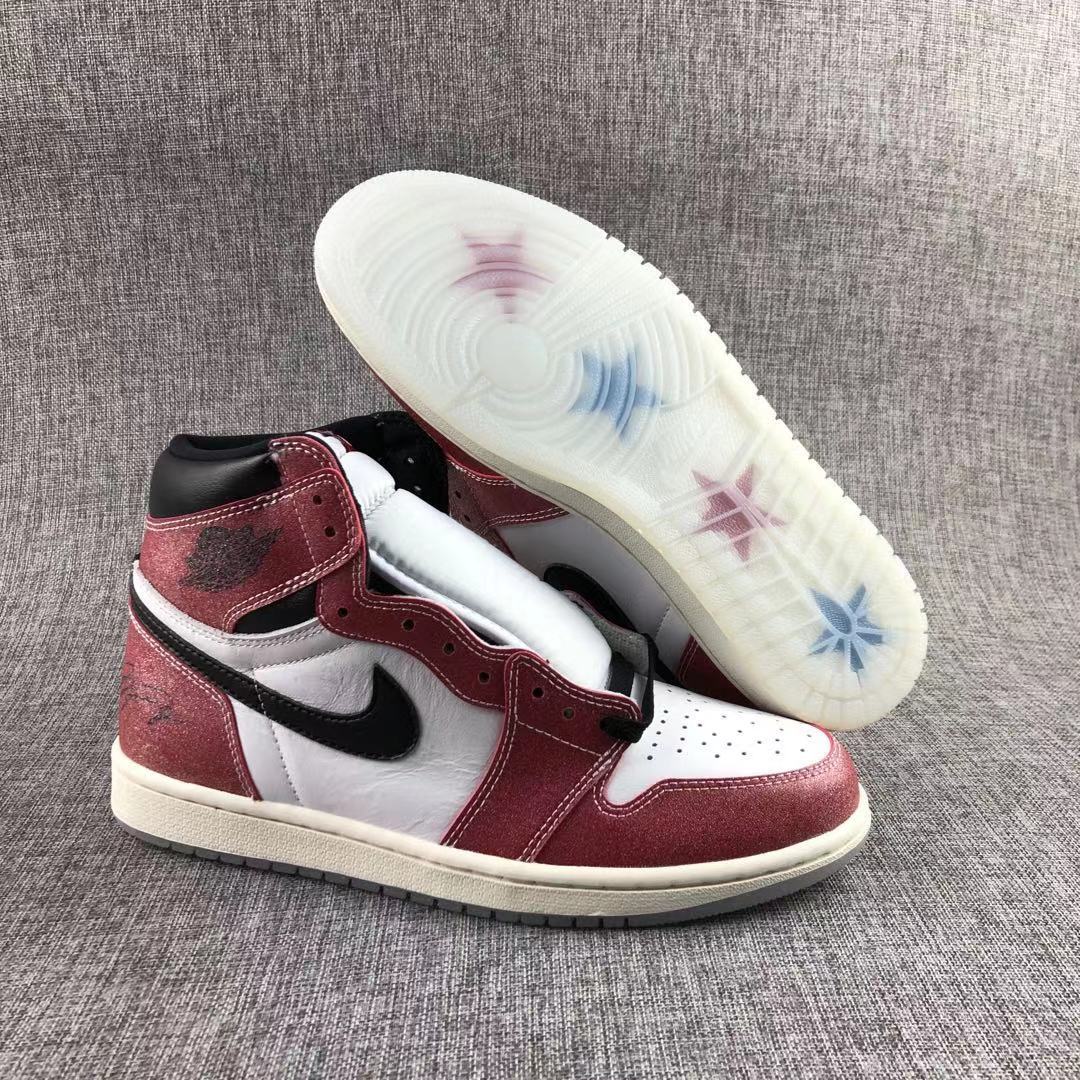 Side view of the pair with one translucent outsole facing upward.