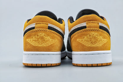 Rear view of the pair showing yellow heels, embroidered Jordan Wings logos, and white midsoles.