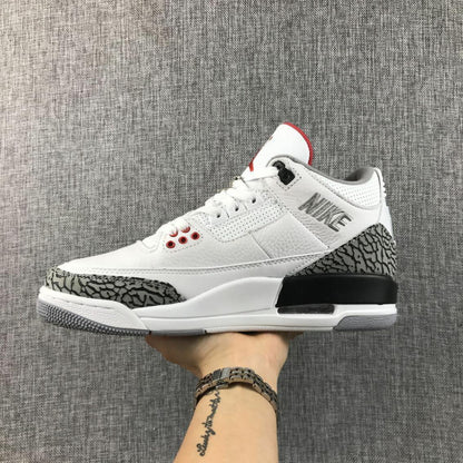 Side view highlighting the visible Swoosh, perforated collar, grey elephant print, and black midsole section.