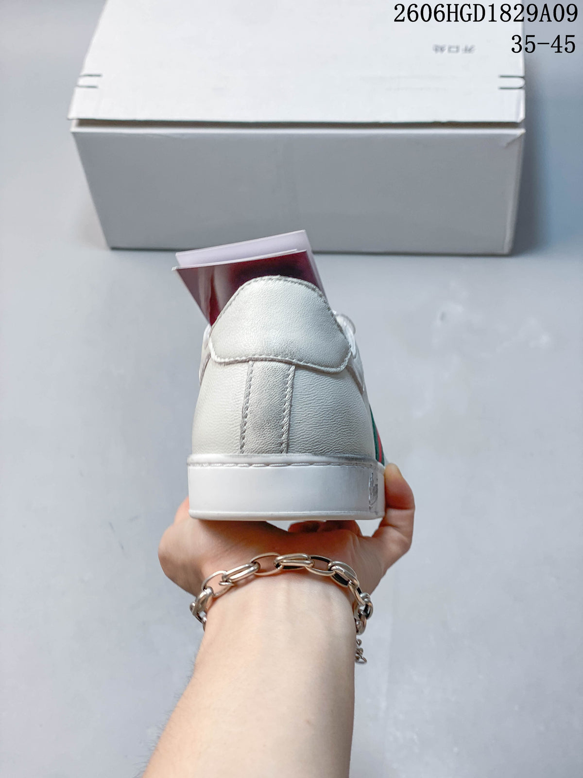 Gucci White Low-Top Sneakers with Red-Green Web Stripe