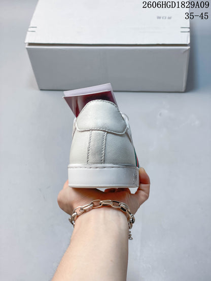 Gucci White Low-Top Sneakers with Red-Green Web Stripe