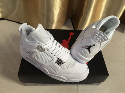 Pair of white Jordan 4 sneakers displayed on a black shoebox, showing the front, side mesh panels, laces, and tongue branding.