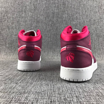 Rear view of both sneakers with pink collars and burgundy heel panels.