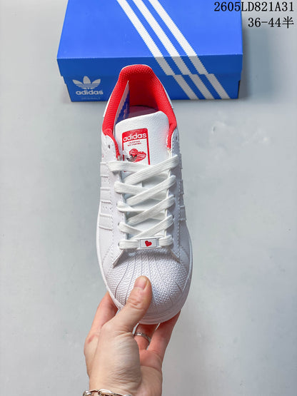 Adidas Superstar White Low-Top Sneakers with Red Accents