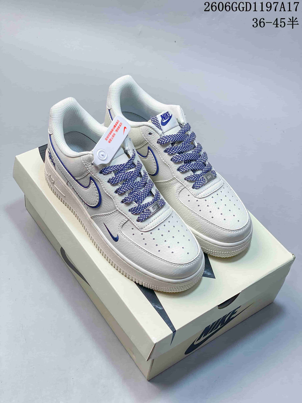 Nike Air Force 1 Low x Stüssy White and Navy Sneakers