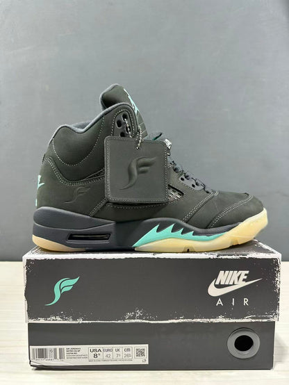 Side view of one Jordan Air Jordan 5 sneaker beside its box; the visible box label shows USA 8.5, EUR 42.5, UK 7.5, and CM 26.5.