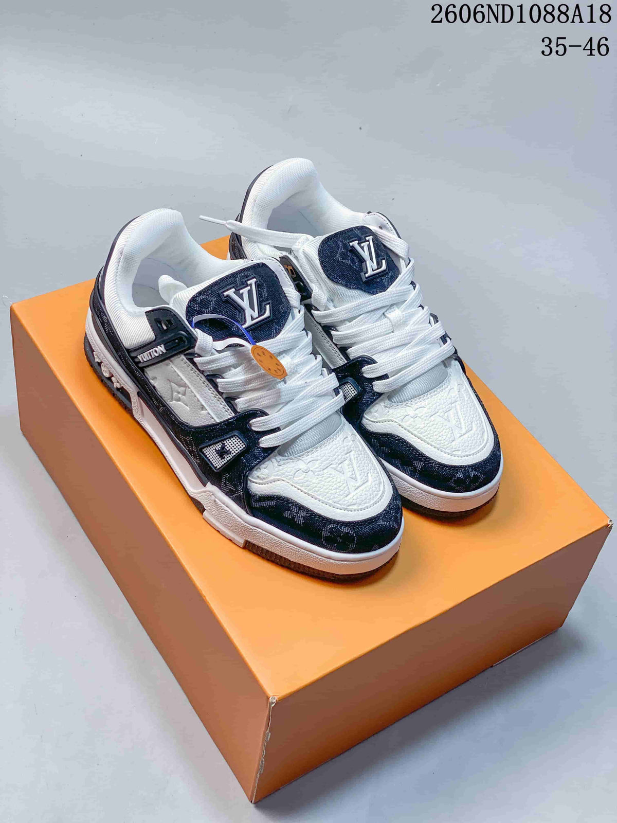 Louis Vuitton Trainer Sneakers in White and Navy