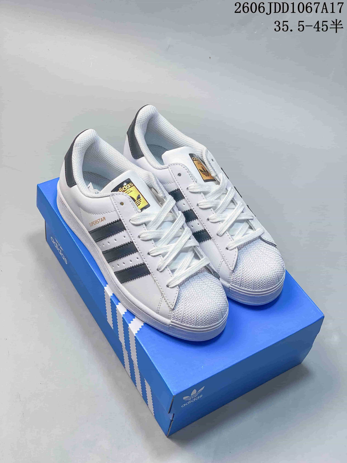 Adidas Superstar Shell-Toe Sneakers in White and Gray