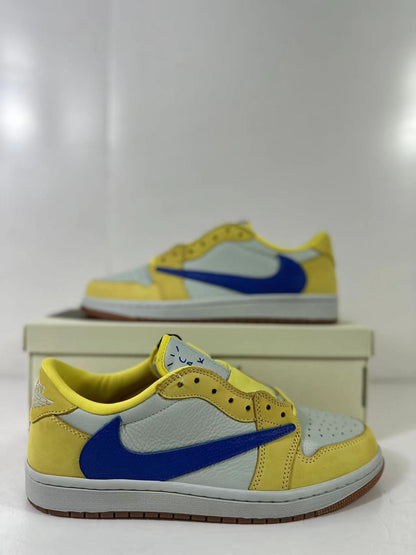 Close side view showing the blue Swoosh, yellow overlays and light blue panels.