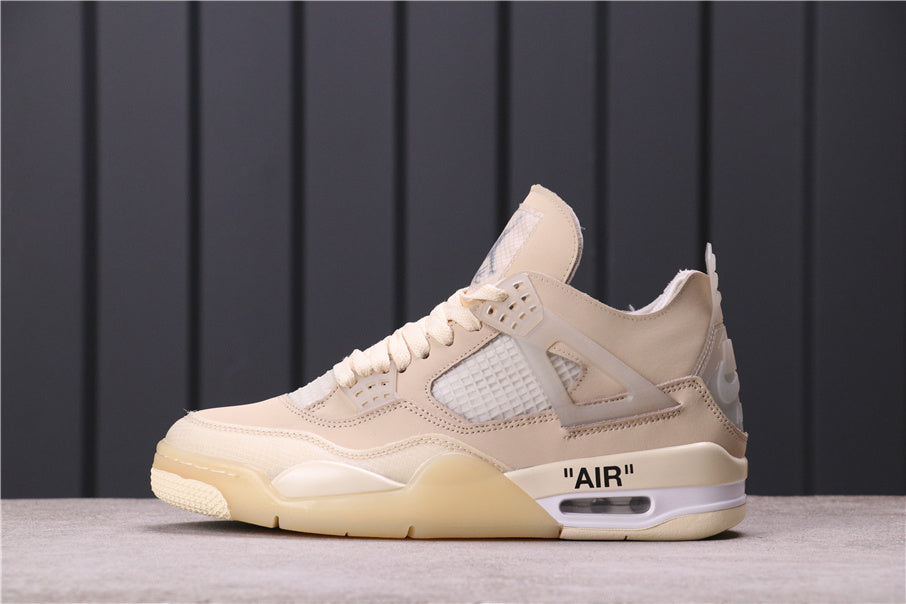 Side profile of a cream Jordan 4 style sneaker with mesh panels, layered overlays, printed AIR detail, and a translucent outsole.
