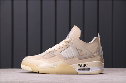 Side profile of a cream Jordan 4 style sneaker with mesh panels, layered overlays, printed AIR detail, and a translucent outsole.