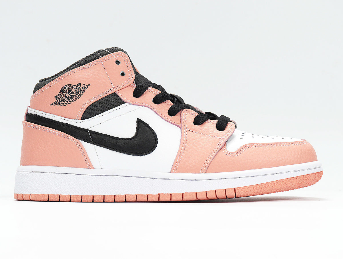Side profile showing the AIR JORDAN Wings branding, black Swoosh, quartz pink overlays, and perforated white toe.