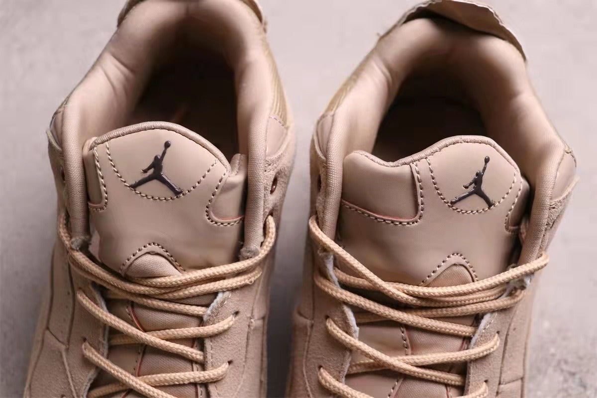 Top view of the padded tongues, Jordan tongue logos, and lace arrangement.