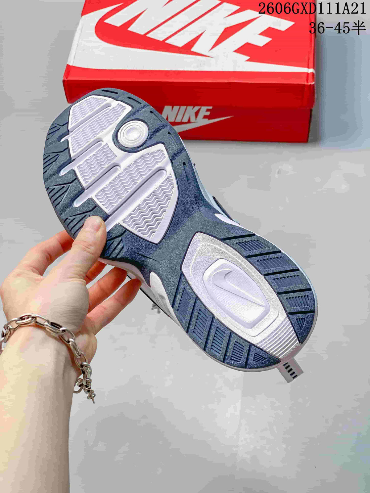 Nike Air Monarch IV White and Blue Low-Top Sneakers