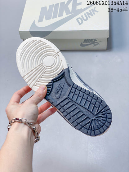 Nike Dunk Low x Undefeated Sneakers in White and Navy