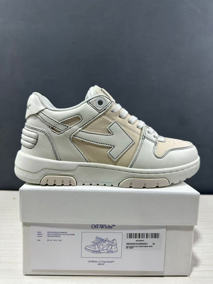 Side view of a cream-white sneaker above its product box; the box label identifies the model and shows size EU 41.