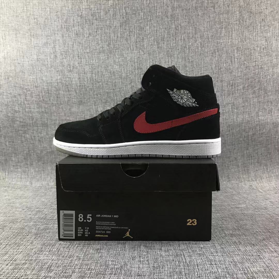 Side profile of the sneaker displayed on a box labeled Air Jordan 1 Mid, showing size US 8.5, EU 42, CM 26.5, and style code 554724-065.