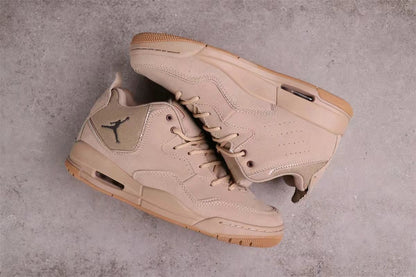 Pair of brown sneakers arranged to show the side profile, outsole edges, and sole windows.