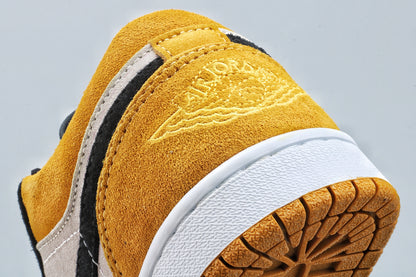 Close-up of the yellow heel and textured outsole edge with Jordan branding visible.