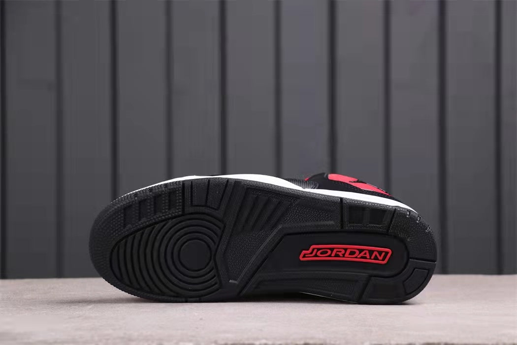 Underside view showing the black rubber outsole and circular forefoot traction pattern.